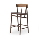 Featuring Buxton Natural Paper Rush Bar + Counter Stool by Four Hands at Amethyst Home. A solid oak counter stool defined by tapered legs and framing gives an updated look to the classic whistler chair. Finished with a paper rush wrapped detail on the back.BarOverall Dimensions: 19.25"w x 22.25"d x 42.75"hWeight: 23.70 lbsCounterOverall Dimensions: 19.50"w . Amethyst Home provides interior design, new home construction design consulting, vintage area rugs, and lighting in the Park City metro area.