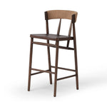 Featuring Buxton Natural Paper Rush Bar + Counter Stool by Four Hands at Amethyst Home. A solid oak counter stool defined by tapered legs and framing gives an updated look to the classic whistler chair. Finished with a paper rush wrapped detail on the back.BarOverall Dimensions: 19.25"w x 22.25"d x 42.75"hWeight: 23.70 lbsCounterOverall Dimensions: 19.50"w x. Amethyst Home provides interior design, new home construction design consulting, vintage area rugs, and lighting in the Portland metro area.