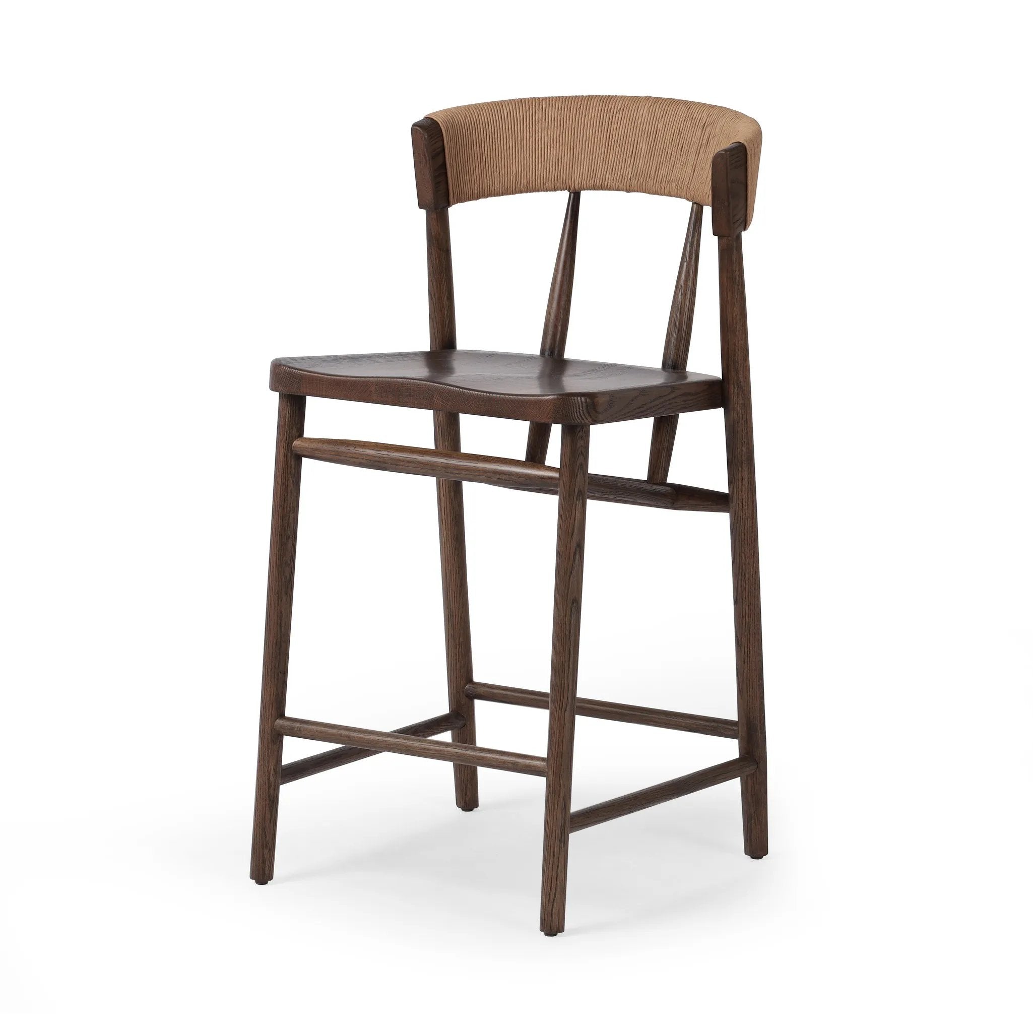 Featuring Buxton Natural Paper Rush Bar + Counter Stool by Four Hands at Amethyst Home. A solid oak counter stool defined by tapered legs and framing gives an updated look to the classic whistler chair. Finished with a paper rush wrapped detail on the back.BarOverall Dimensions: 19.25"w x 22.25"d x 42.75"hWeight: 23.70 lbsCounterOverall Dimensions: 19.50"w. Amethyst Home provides interior design, new home construction design consulting, vintage area rugs, and lighting in the Washington metro area.