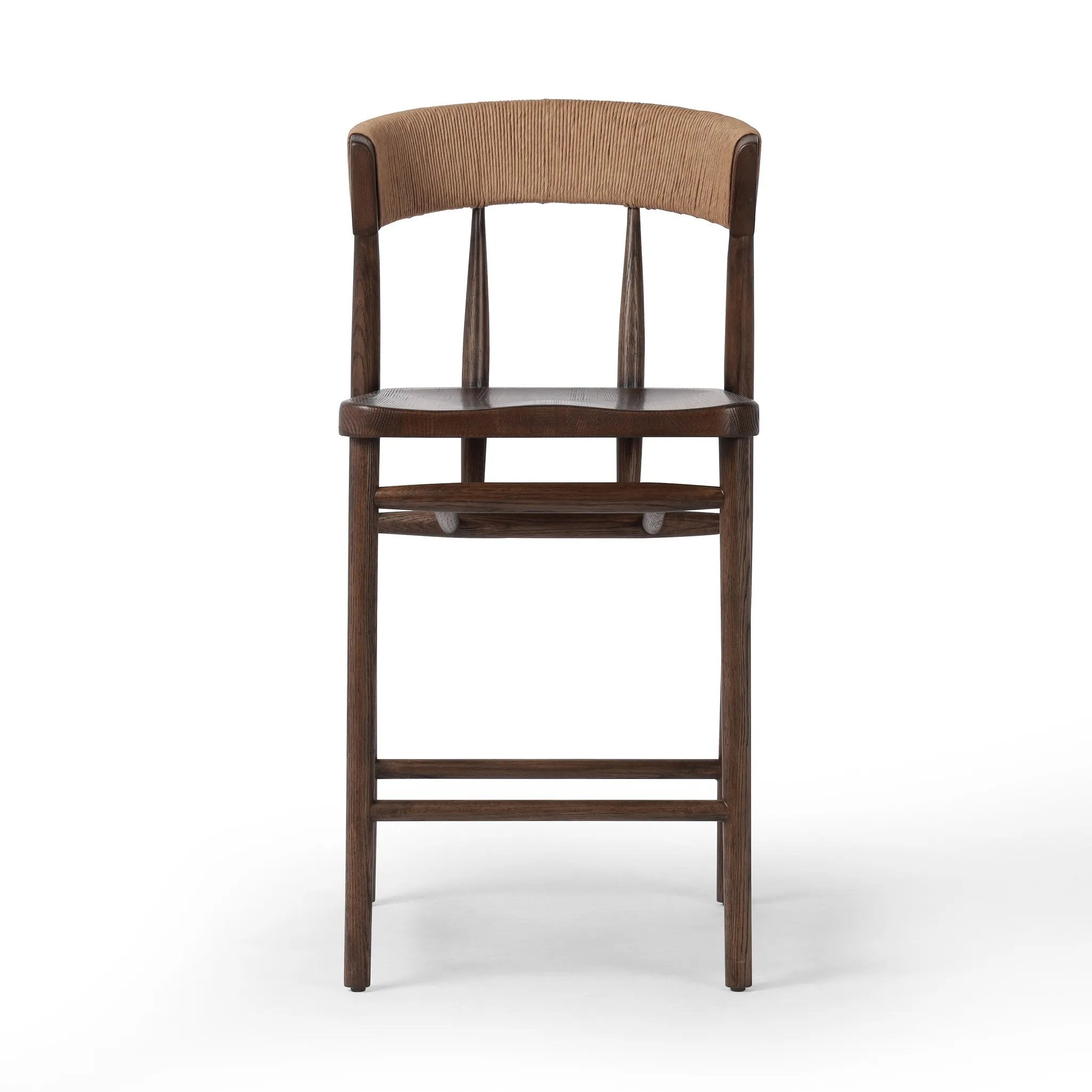 Featuring Buxton Natural Paper Rush Bar + Counter Stool by Four Hands at Amethyst Home. A solid oak counter stool defined by tapered legs and framing gives an updated look to the classic whistler chair. Finished with a paper rush wrapped detail on the back.BarOverall Dimensions: 19.25"w x 22.25"d x 42.75"hWeight: 23.70 lbsCounterOverall Dimensions: 19.5. Amethyst Home provides interior design, new home construction design consulting, vintage area rugs, and lighting in the Winter Garden metro area.
