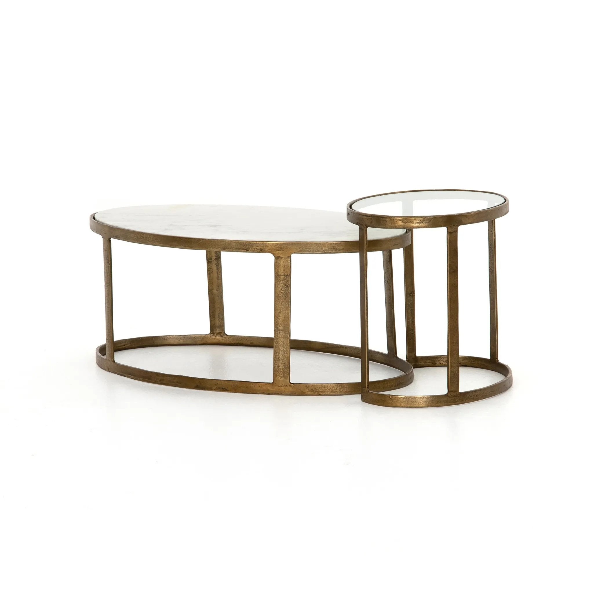 Shapely surfaces, designed to slide together or apart with ease. A raw brass finish lends a lived-in feel to aluminum framing, with one oval-shaped nester topped by polished white marble pairing with a taller, rounded table featuring tempered glass.    Large Table: 38.00"w x 24.00"d x 15.50"h  Small Table: 23.25"w x 15.75"d x 18.75" Amethyst Home provides interior design, new home construction design consulting, vintage area rugs, and lighting in the Winter Garden metro area.