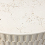 Cast concrete shapes a drum-style outdoor coffee table, with a linear pattern layered for added texture. Finished with a parchment-like textural feel. Cover or store inside during inclement weather and when not in use.As lovers of wabi sabi design at Amethyst, we love the warm modern inspired Callisto Outdoor Coffee Table - Aged White Concrete. Amethyst Home provides interior design, new home construction design consulting, vintage area rugs, and lighting in the Alpharetta metro area.