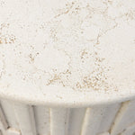 Cast concrete shapes a drum-style outdoor end table, with a linear pattern layered for added texture. Finished with a parchment-like textural feel. Cover or store inside during inclement weather and when not in use.As enthusiasts of luxe style at Amethyst, we love the optimistic inspired Callisto Outdoor End Table - Aged White Concrete. Amethyst Home provides interior design, new home construction design consulting, vintage area rugs, and lighting in the Alpharetta metro area.