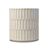 Cast concrete shapes a drum-style outdoor end table, with a linear pattern layered for added texture. Finished with a parchment-like textural feel. Cover or store inside during inclement weather and when not in use.As enthusiasts of luxe style at Amethyst, we love the optimistic inspired Callisto Outdoor End Table - Aged White Concrete. Amethyst Home provides interior design, new home construction design consulting, vintage area rugs, and lighting in the Austin metro area.