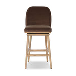 Solid ash wood forms a subtly curved back on this everyday counter stool. Its open frame and seat features rounded edges for a softer look throughout. Its plush cushioned seat and tall back are upholstered in a surrey mink velvet fabric. Designed with a 360-degree swivel Amethyst Home provides interior design, new home construction design consulting, vintage area rugs, and lighting in the Laguna Beach metro area.