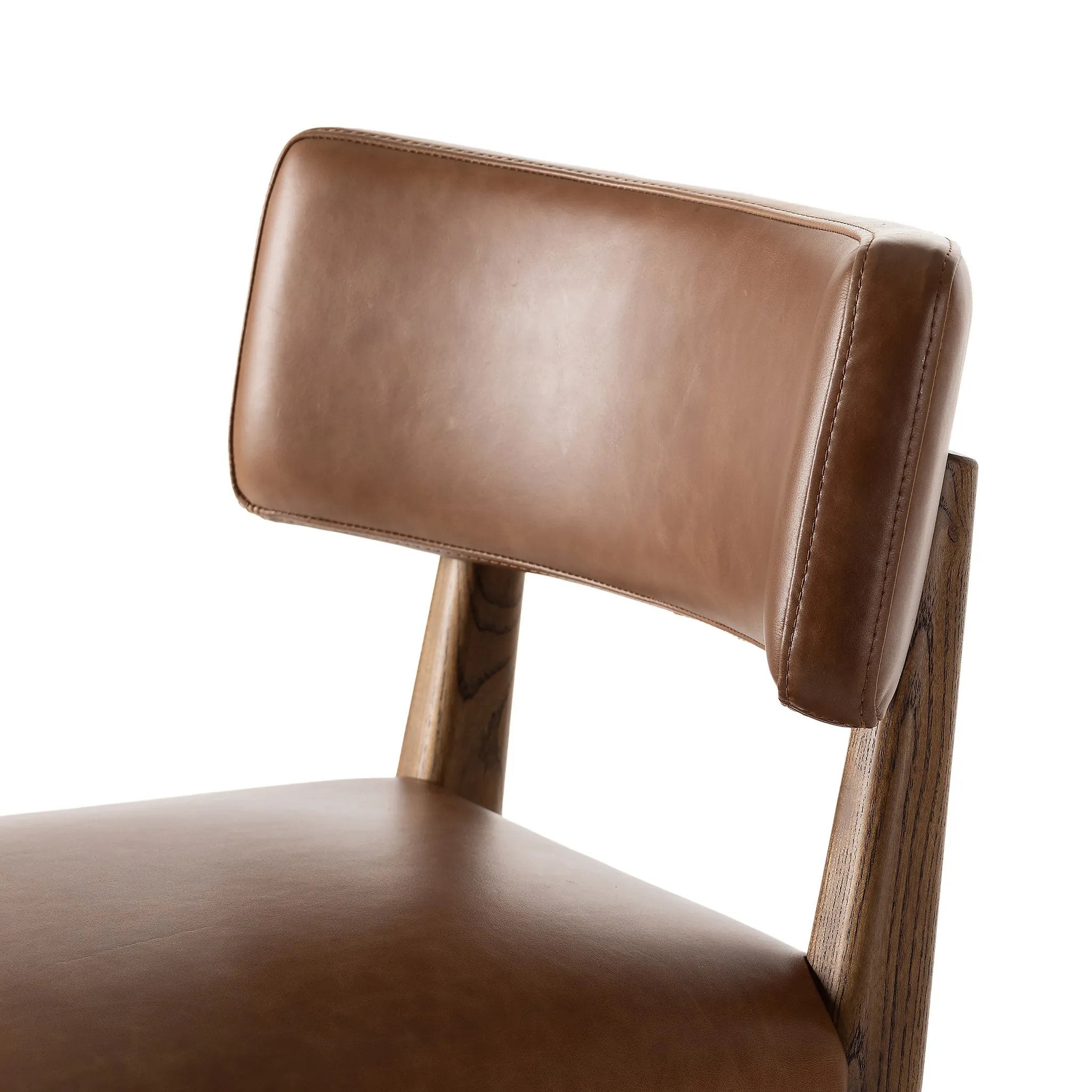 Featuring Cardell Sonoma Chestnut Swivel Bar + Counter Stool by Four Hands at Amethyst Home. This reimagined classic pairs a barrel back frame of solid nettlewood with top-grain leather in a rich chestnut. A 180-degree swivel with return memory tops off the piece with fresh functionality.BarOverall Dimensions: 21.50"w x 22.25"d x 42.50"hWeight: 24.25 lbsCounte. Amethyst Home provides interior design, new home construction design consulting, vintage area rugs, and lighting in the Austin metro area.