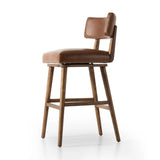 Featuring Cardell Sonoma Chestnut Swivel Bar + Counter Stool by Four Hands at Amethyst Home. This reimagined classic pairs a barrel back frame of solid nettlewood with top-grain leather in a rich chestnut. A 180-degree swivel with return memory tops off the piece with fresh functionality.BarOverall Dimensions: 21.50"w x 22.25"d x 42.50"hWeight: 24.25 l. Amethyst Home provides interior design, new home construction design consulting, vintage area rugs, and lighting in the Salt Lake City metro area.