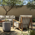 Featuring Cardiff Faye Sand Outdoor Chair by Four Hands at Amethyst Home. Angular FSC®-certified teak framing paired with softened dowel edges crafts a bench-made, transitional outdoor chair. Strap detailing supports the loose, knife-edge back cushion, complemented by a heavy fixed seat cushion — adding a touch of weight to the airy design. Cover or store ind. Amethyst Home provides interior design, new home construction design consulting, vintage area rugs, and lighting in the Houston metro area.