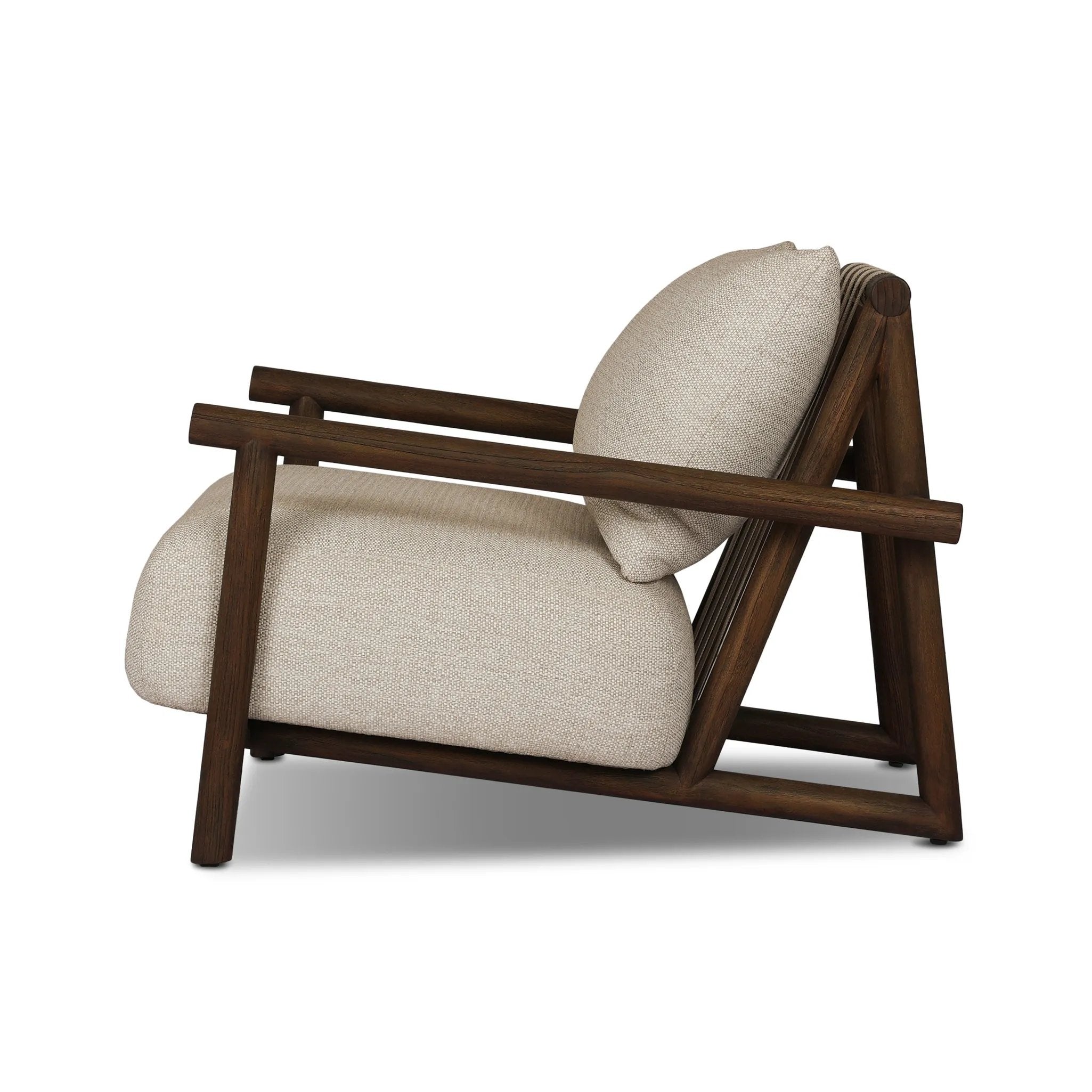 Featuring Cardiff Faye Sand Outdoor Chair by Four Hands at Amethyst Home. Angular FSC®-certified teak framing paired with softened dowel edges crafts a bench-made, transitional outdoor chair. Strap detailing supports the loose, knife-edge back cushion, complemented by a heavy fixed seat cushion — adding a touch of weight to the airy design. Cover or store . Amethyst Home provides interior design, new home construction design consulting, vintage area rugs, and lighting in the Scottsdale metro area.