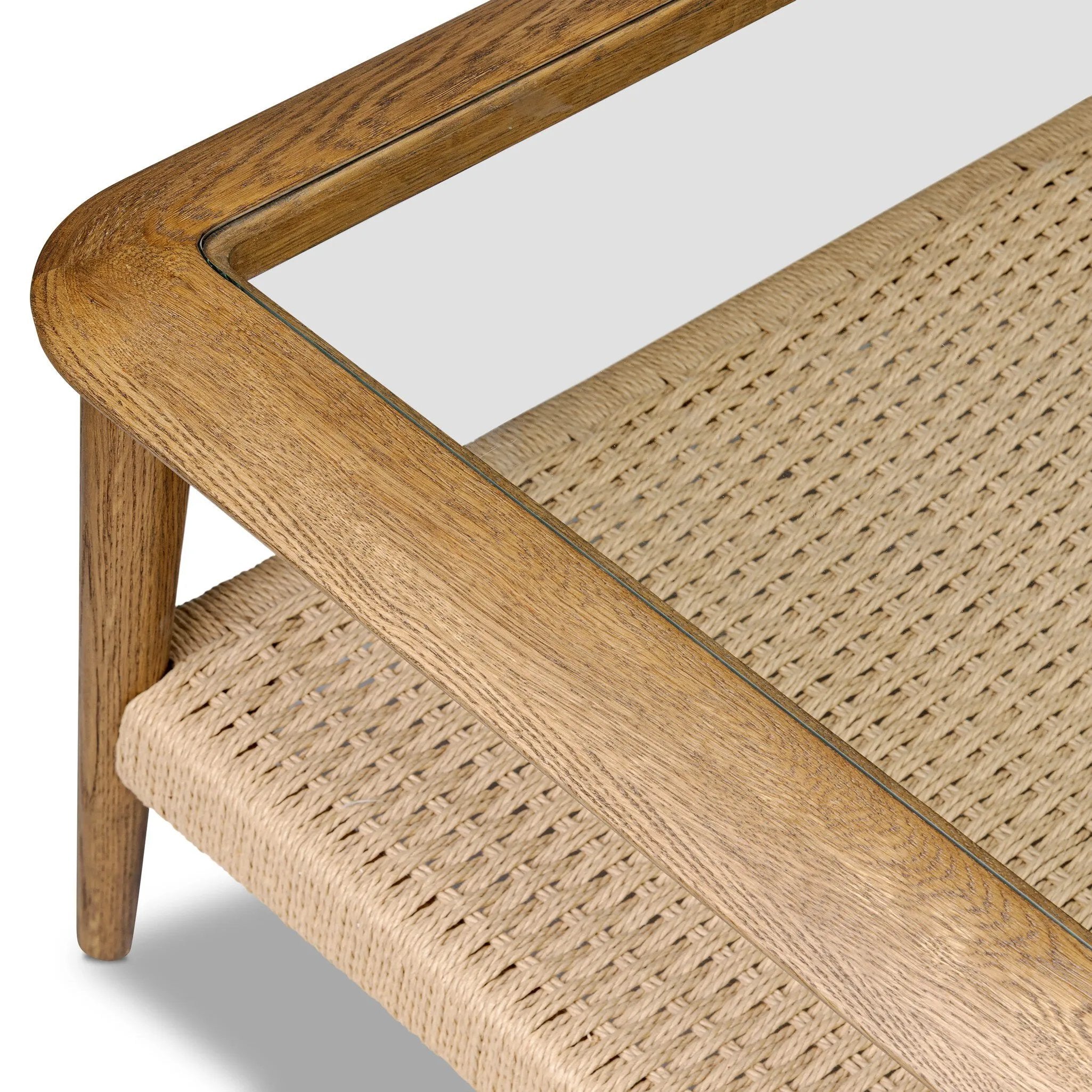 Anchor your space with mixed materials. Made from brown oak, natural paper cord and tempered glass, with shelving for extra storage and display Amethyst Home provides interior design, new home construction design consulting, vintage area rugs, and lighting in the Scottsdale metro area.