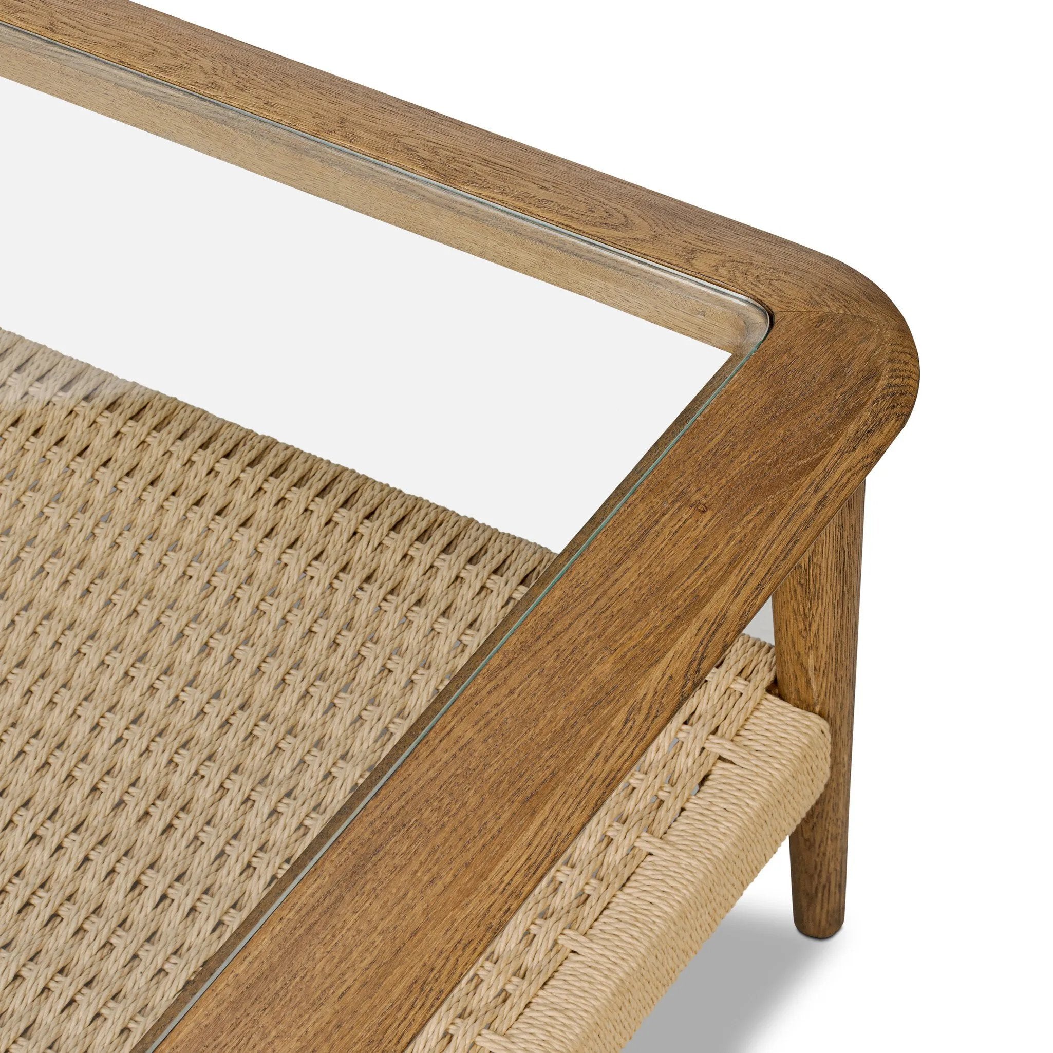 Anchor your space with mixed materials. Made from brown oak, natural paper cord and tempered glass, with shelving for extra storage and display Amethyst Home provides interior design, new home construction design consulting, vintage area rugs, and lighting in the Seattle metro area.