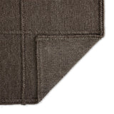 Hand woven in a flat weave grid pattern for the look of an indoor textile, this  mineral-hued rug grounds the outdoor lounge with a high-texture look. Slight variation in sizing and imperfect lines due to the handcrafted nature of each piece are to be expected. Store inside during inclement weather and when not in use. Amethyst Home provides interior design, new home construction design consulting, vintage area rugs, and lighting in the Park City metro area.