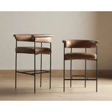 Featuring Carrie Chaps Saddle Bar + Counter Stool by Four Hands at Amethyst Home. Airy and light with slim, matte black-finished iron framing, tan top-grain leather lends sleekness to a beautifully sculpted counter style featuring a yoke back and exterior fold detailing.BarOverall Dimensions: 25.50"w x 23.00"d x 39.50"hWeight: 33.95 lbsCounterOverall Dimension. Amethyst Home provides interior design, new home construction design consulting, vintage area rugs, and lighting in the Boston metro area.