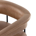 Featuring Carrie Chaps Saddle Bar + Counter Stool by Four Hands at Amethyst Home. Airy and light with slim, matte black-finished iron framing, tan top-grain leather lends sleekness to a beautifully sculpted counter style featuring a yoke back and exterior fold detailing.BarOverall Dimensions: 25.50"w x 23.00"d x 39.50"hWeight: 33.95 lbsCounterOverall Dimens. Amethyst Home provides interior design, new home construction design consulting, vintage area rugs, and lighting in the Calabasas metro area.