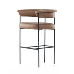 Featuring Carrie Chaps Saddle Bar + Counter Stool by Four Hands at Amethyst Home. Airy and light with slim, matte black-finished iron framing, tan top-grain leather lends sleekness to a beautifully sculpted counter style featuring a yoke back and exterior fold detailing.BarOverall Dimensions: 25.50"w x 23.00"d x 39.50"hWeight: 33.95 lbsCounterOverall Dimens. Amethyst Home provides interior design, new home construction design consulting, vintage area rugs, and lighting in the Charlotte metro area.