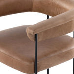 Featuring Carrie Chaps Saddle Bar + Counter Stool by Four Hands at Amethyst Home. Airy and light with slim, matte black-finished iron framing, tan top-grain leather lends sleekness to a beautifully sculpted counter style featuring a yoke back and exterior fold detailing.BarOverall Dimensions: 25.50"w x 23.00"d x 39.50"hWeight: 33.95 lbsCounterOverall Dime. Amethyst Home provides interior design, new home construction design consulting, vintage area rugs, and lighting in the Kansas City metro area.