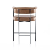 Featuring Carrie Chaps Saddle Bar + Counter Stool by Four Hands at Amethyst Home. Airy and light with slim, matte black-finished iron framing, tan top-grain leather lends sleekness to a beautifully sculpted counter style featuring a yoke back and exterior fold detailing.BarOverall Dimensions: 25.50"w x 23.00"d x 39.50"hWeight: 33.95 lbsCounterOverall Dim. Amethyst Home provides interior design, new home construction design consulting, vintage area rugs, and lighting in the Laguna Beach metro area.
