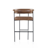 Featuring Carrie Chaps Saddle Bar + Counter Stool by Four Hands at Amethyst Home. Airy and light with slim, matte black-finished iron framing, tan top-grain leather lends sleekness to a beautifully sculpted counter style featuring a yoke back and exterior fold detailing.BarOverall Dimensions: 25.50"w x 23.00"d x 39.50"hWeight: 33.95 lbsCounterOverall Dimensions. Amethyst Home provides interior design, new home construction design consulting, vintage area rugs, and lighting in the Miami metro area.