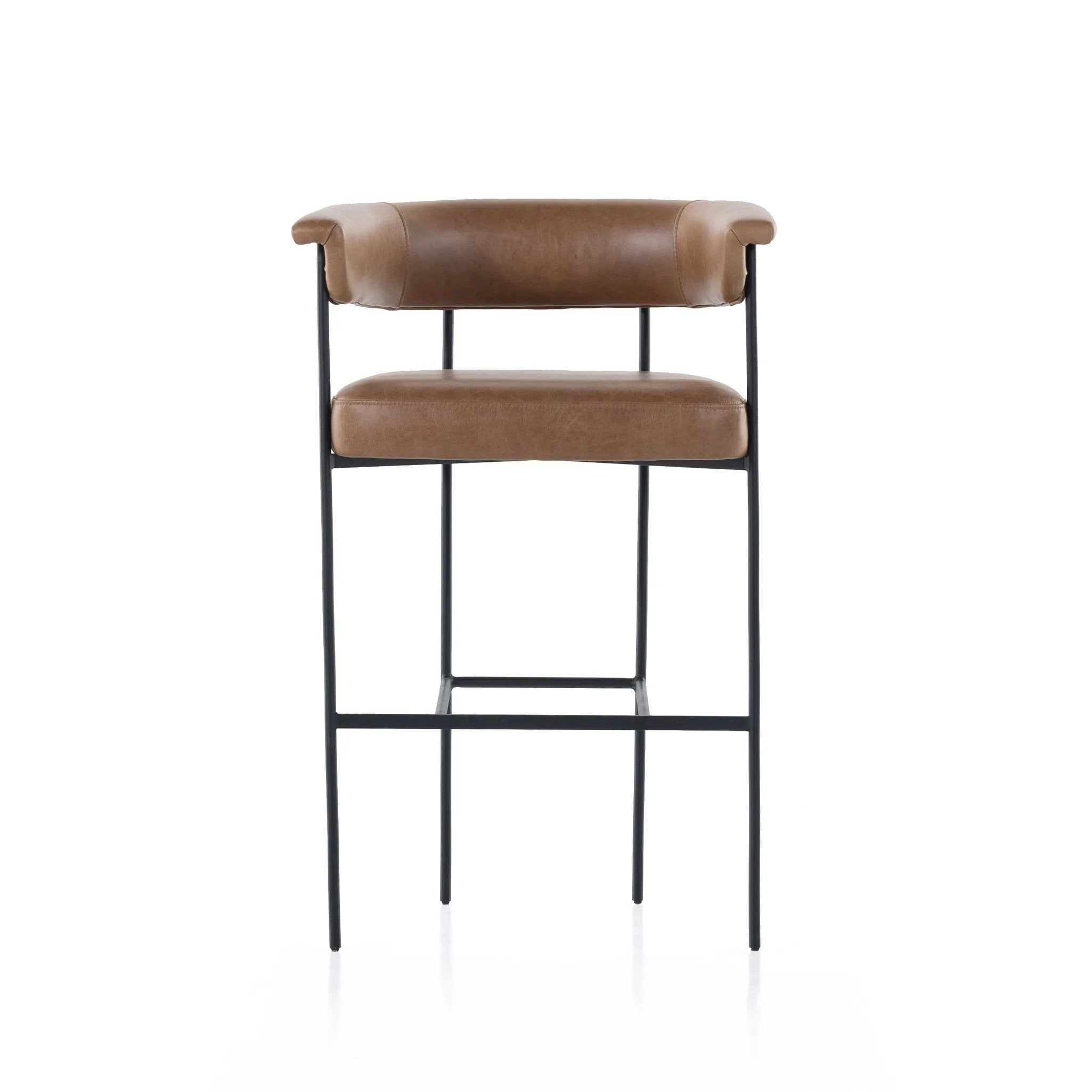 Featuring Carrie Chaps Saddle Bar + Counter Stool by Four Hands at Amethyst Home. Airy and light with slim, matte black-finished iron framing, tan top-grain leather lends sleekness to a beautifully sculpted counter style featuring a yoke back and exterior fold detailing.BarOverall Dimensions: 25.50"w x 23.00"d x 39.50"hWeight: 33.95 lbsCounterOverall Dimensions. Amethyst Home provides interior design, new home construction design consulting, vintage area rugs, and lighting in the Miami metro area.