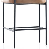 Featuring Carrie Chaps Saddle Bar + Counter Stool by Four Hands at Amethyst Home. Airy and light with slim, matte black-finished iron framing, tan top-grain leather lends sleekness to a beautifully sculpted counter style featuring a yoke back and exterior fold detailing.BarOverall Dimensions: 25.50"w x 23.00"d x 39.50"hWeight: 33.95 lbsCounterOverall Dimensi. Amethyst Home provides interior design, new home construction design consulting, vintage area rugs, and lighting in the Monterey metro area.