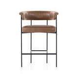 Featuring Carrie Chaps Saddle Bar + Counter Stool by Four Hands at Amethyst Home. Airy and light with slim, matte black-finished iron framing, tan top-grain leather lends sleekness to a beautifully sculpted counter style featuring a yoke back and exterior fold detailing.BarOverall Dimensions: 25.50"w x 23.00"d x 39.50"hWeight: 33.95 lbsCounterOverall Dimens. Amethyst Home provides interior design, new home construction design consulting, vintage area rugs, and lighting in the Nashville metro area.
