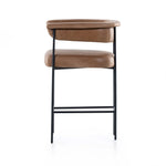 Featuring Carrie Chaps Saddle Bar + Counter Stool by Four Hands at Amethyst Home. Airy and light with slim, matte black-finished iron framing, tan top-grain leather lends sleekness to a beautifully sculpted counter style featuring a yoke back and exterior fold detailing.BarOverall Dimensions: 25.50"w x 23.00"d x 39.50"hWeight: 33.95 lbsCounterOverall Dimen. Amethyst Home provides interior design, new home construction design consulting, vintage area rugs, and lighting in the Washington metro area.