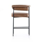 Featuring Carrie Chaps Saddle Bar + Counter Stool by Four Hands at Amethyst Home. Airy and light with slim, matte black-finished iron framing, tan top-grain leather lends sleekness to a beautifully sculpted counter style featuring a yoke back and exterior fold detailing.BarOverall Dimensions: 25.50"w x 23.00"d x 39.50"hWeight: 33.95 lbsCounterOverall Dimen. Amethyst Home provides interior design, new home construction design consulting, vintage area rugs, and lighting in the Washington metro area.