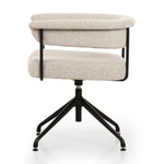 Featuring Carrie Light Camel Desk Chair by Four Hands at Amethyst Home. Airy and light with slim, black-finished iron framing, light camel-colored upholstery lends texture to a sculpted desk chair featuring a yoke back and exterior fold detailing. Height adjustable and with 360 swivel for everyday comfort.Overall Dimensions: 25.50"w x 23.00"d x 27.50"hWeight. Amethyst Home provides interior design, new home construction design consulting, vintage area rugs, and lighting in the Monterey metro area.