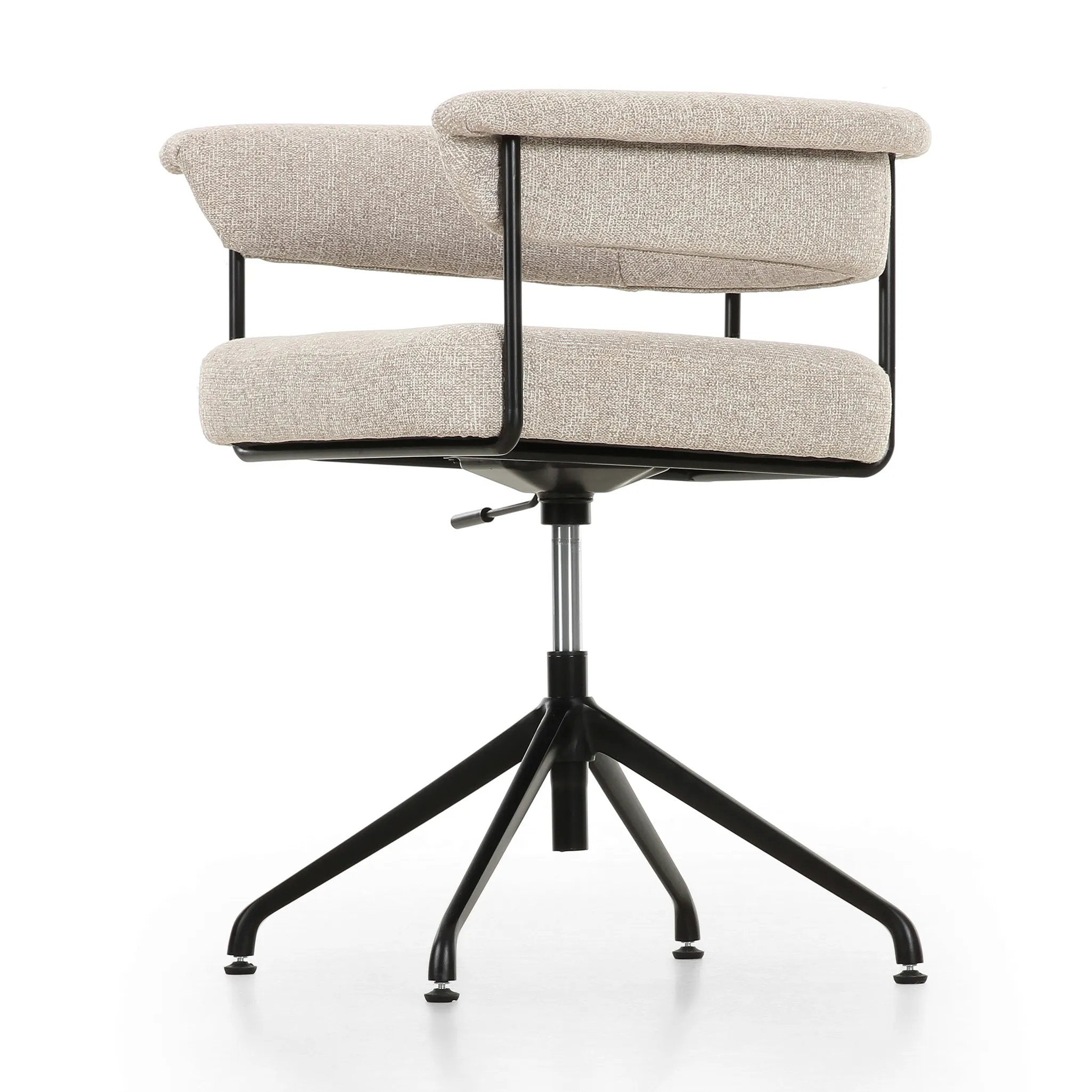 Featuring Carrie Light Camel Desk Chair by Four Hands at Amethyst Home. Airy and light with slim, black-finished iron framing, light camel-colored upholstery lends texture to a sculpted desk chair featuring a yoke back and exterior fold detailing. Height adjustable and with 360 swivel for everyday comfort.Overall Dimensions: 25.50"w x 23.00"d x 27.50"hWeight : . Amethyst Home provides interior design, new home construction design consulting, vintage area rugs, and lighting in the Tampa metro area.
