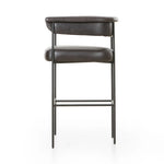 Featuring Carrie Sonoma Black Bar + Counter Stool by Four Hands at Amethyst Home. Airy and light with slim, black-finished iron framing, top-grain leather lends texture to a beautifully sculpted bar stool featuring a yoke back plus fold detailing.BarOverall Dimensions: 25.50"w x 23.00"d x 39.50"hWeight: 33.95 lbsCounterOverall Dimensions: 25.50"w x 23.00"d . Amethyst Home provides interior design, new home construction design consulting, vintage area rugs, and lighting in the Charlotte metro area.