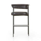 Featuring Carrie Sonoma Black Bar + Counter Stool by Four Hands at Amethyst Home. Airy and light with slim, black-finished iron framing, top-grain leather lends texture to a beautifully sculpted bar stool featuring a yoke back plus fold detailing.BarOverall Dimensions: 25.50"w x 23.00"d x 39.50"hWeight: 33.95 lbsCounterOverall Dimensions: 25.50"w x 23.00"d . Amethyst Home provides interior design, new home construction design consulting, vintage area rugs, and lighting in the Charlotte metro area.