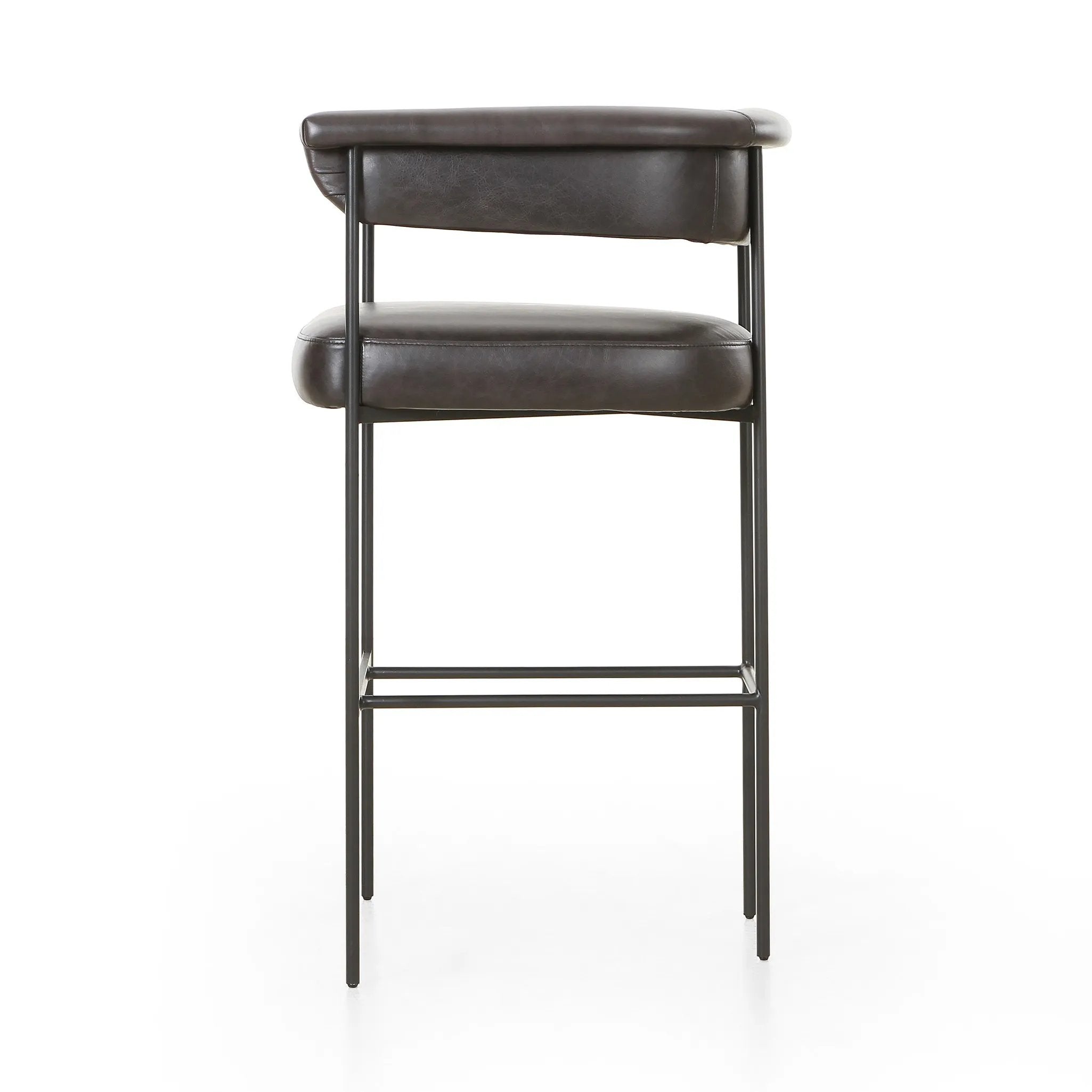 Featuring Carrie Sonoma Black Bar + Counter Stool by Four Hands at Amethyst Home. Airy and light with slim, black-finished iron framing, top-grain leather lends texture to a beautifully sculpted bar stool featuring a yoke back plus fold detailing.BarOverall Dimensions: 25.50"w x 23.00"d x 39.50"hWeight: 33.95 lbsCounterOverall Dimensions: 25.50"w x 23.00"d . Amethyst Home provides interior design, new home construction design consulting, vintage area rugs, and lighting in the Charlotte metro area.