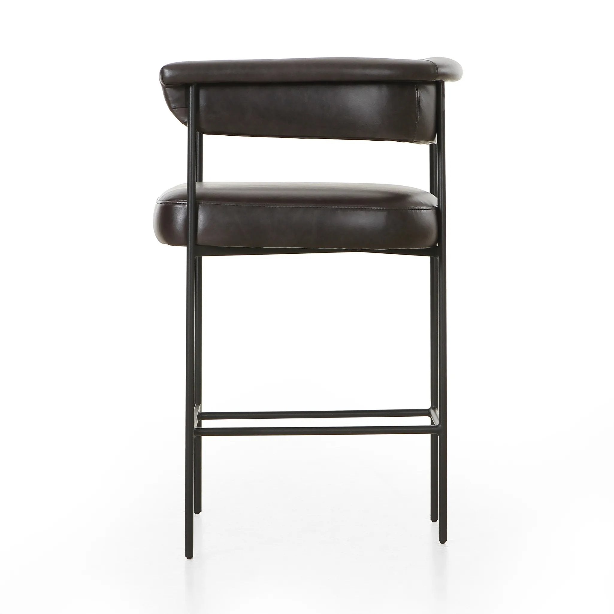 Featuring Carrie Sonoma Black Bar + Counter Stool by Four Hands at Amethyst Home. Airy and light with slim, black-finished iron framing, top-grain leather lends texture to a beautifully sculpted bar stool featuring a yoke back plus fold detailing.BarOverall Dimensions: 25.50"w x 23.00"d x 39.50"hWeight: 33.95 lbsCounterOverall Dimensions: 25.50"w x 23.00"d x . Amethyst Home provides interior design, new home construction design consulting, vintage area rugs, and lighting in the Houston metro area.