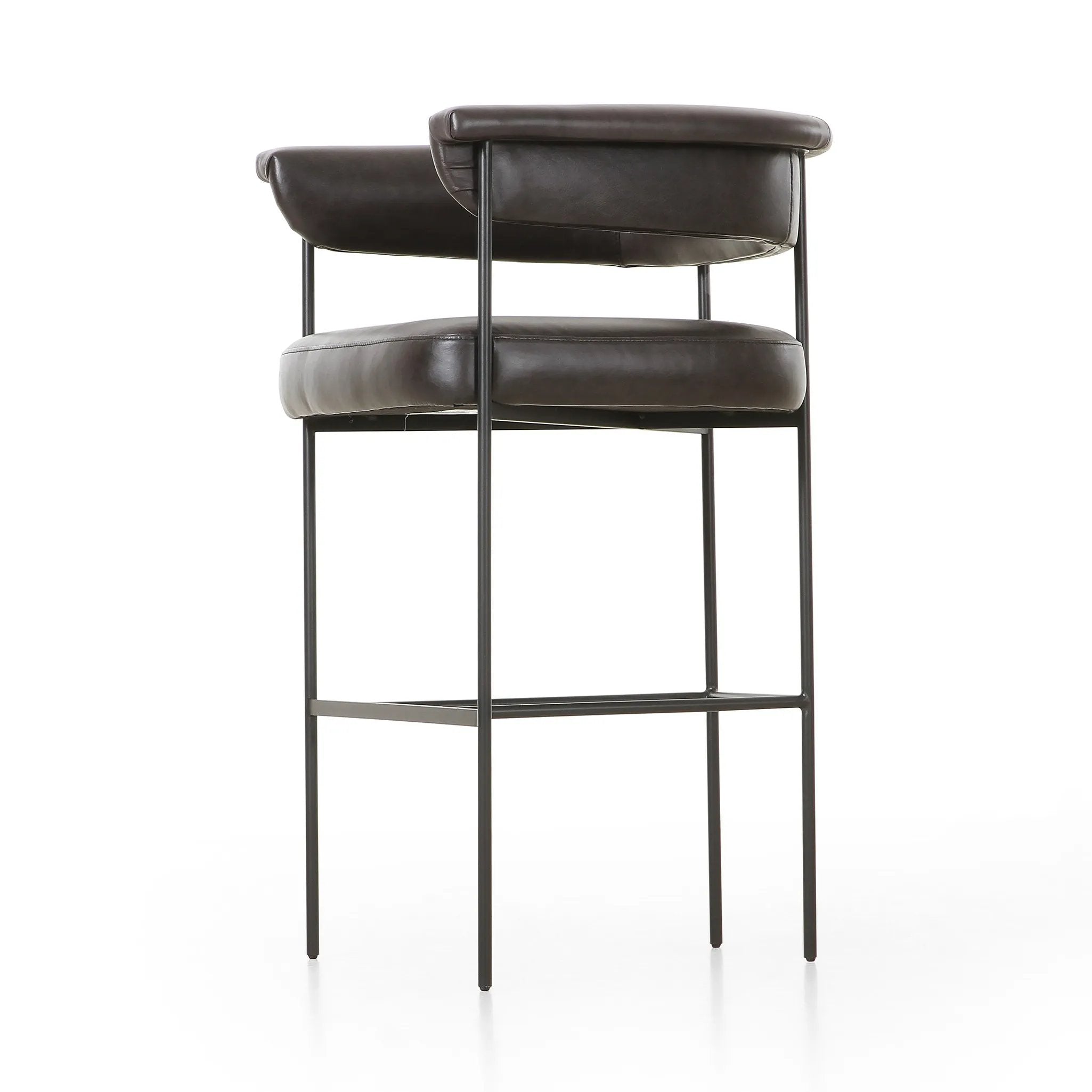 Featuring Carrie Sonoma Black Bar + Counter Stool by Four Hands at Amethyst Home. Airy and light with slim, black-finished iron framing, top-grain leather lends texture to a beautifully sculpted bar stool featuring a yoke back plus fold detailing.BarOverall Dimensions: 25.50"w x 23.00"d x 39.50"hWeight: 33.95 lbsCounterOverall Dimensions: 25.50"w x 23.00". Amethyst Home provides interior design, new home construction design consulting, vintage area rugs, and lighting in the Kansas City metro area.