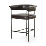 Featuring Carrie Sonoma Black Bar + Counter Stool by Four Hands at Amethyst Home. Airy and light with slim, black-finished iron framing, top-grain leather lends texture to a beautifully sculpted bar stool featuring a yoke back plus fold detailing.BarOverall Dimensions: 25.50"w x 23.00"d x 39.50"hWeight: 33.95 lbsCounterOverall Dimensions: 25.50"w x 23.00. Amethyst Home provides interior design, new home construction design consulting, vintage area rugs, and lighting in the Laguna Beach metro area.