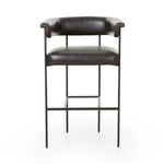 Featuring Carrie Sonoma Black Bar + Counter Stool by Four Hands at Amethyst Home. Airy and light with slim, black-finished iron framing, top-grain leather lends texture to a beautifully sculpted bar stool featuring a yoke back plus fold detailing.BarOverall Dimensions: 25.50"w x 23.00"d x 39.50"hWeight: 33.95 lbsCounterOverall Dimensions: 25.50"w x 23.00"d . Amethyst Home provides interior design, new home construction design consulting, vintage area rugs, and lighting in the Park City metro area.