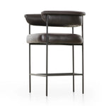 Featuring Carrie Sonoma Black Bar + Counter Stool by Four Hands at Amethyst Home. Airy and light with slim, black-finished iron framing, top-grain leather lends texture to a beautifully sculpted bar stool featuring a yoke back plus fold detailing.BarOverall Dimensions: 25.50"w x 23.00"d x 39.50"hWeight: 33.95 lbsCounterOverall Dimensions: 25.50"w x 23.00"d x. Amethyst Home provides interior design, new home construction design consulting, vintage area rugs, and lighting in the Portland metro area.
