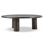 Featuring Cary Distressed Bronze Coffee Table by Four Hands at Amethyst Home. A round, three-legged coffee table of cast aluminum is finished in a beautiful distressed bronze. The result: a luxe take on industrial that moves between spaces and styles with ease.Overall Dimensions: 50.00"w x 50.00"d x 15.75"hWeight : 132.54 lbsMaterials: Aluminum. Amethyst Home provides interior design, new home construction design consulting, vintage area rugs, and lighting in the Boston metro area.