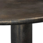 Featuring Cary Distressed Bronze Coffee Table by Four Hands at Amethyst Home. A round, three-legged coffee table of cast aluminum is finished in a beautiful distressed bronze. The result: a luxe take on industrial that moves between spaces and styles with ease.Overall Dimensions: 50.00"w x 50.00"d x 15.75"hWeight : 132.54 lbsMaterials: Aluminum. Amethyst Home provides interior design, new home construction design consulting, vintage area rugs, and lighting in the Charlotte metro area.