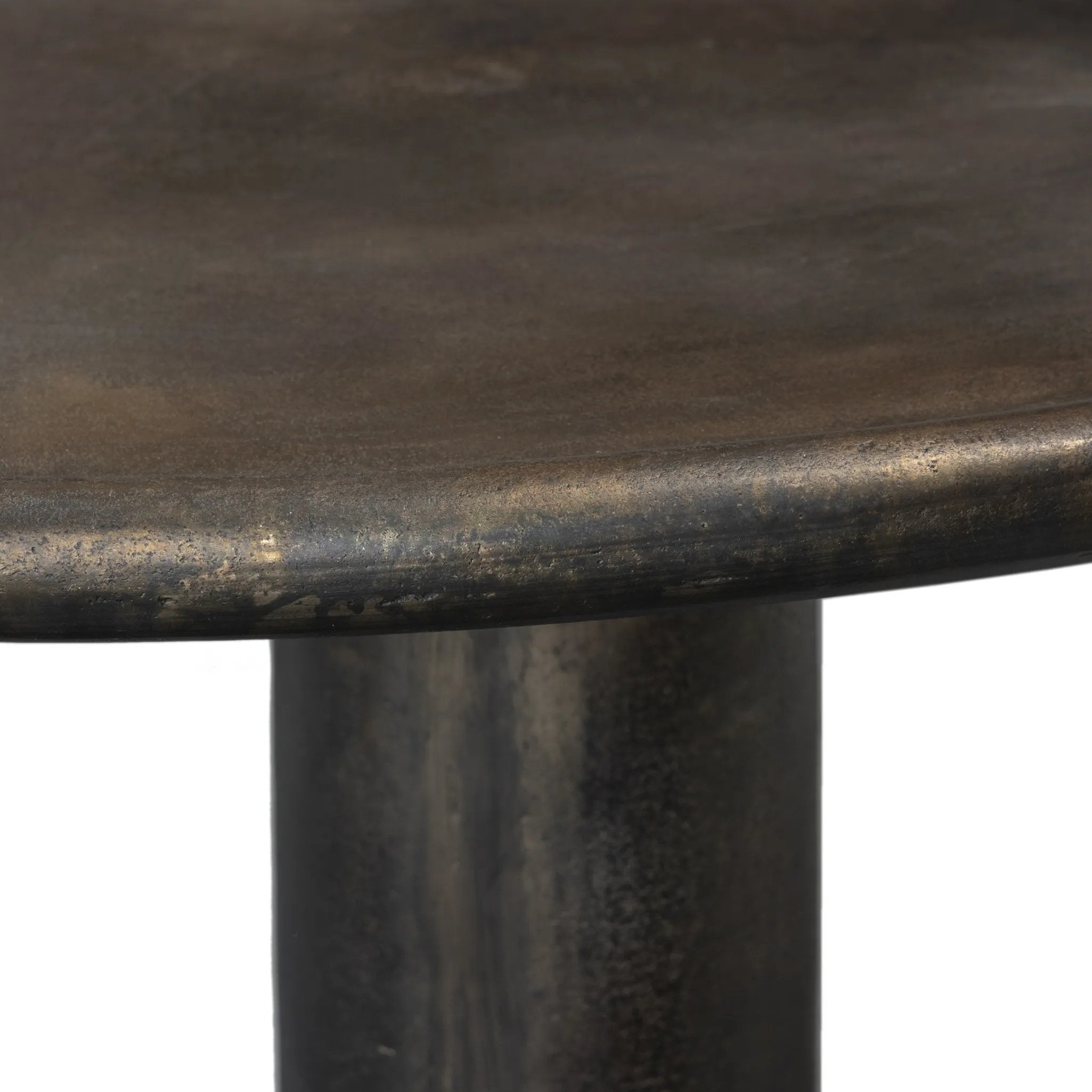 Featuring Cary Distressed Bronze Coffee Table by Four Hands at Amethyst Home. A round, three-legged coffee table of cast aluminum is finished in a beautiful distressed bronze. The result: a luxe take on industrial that moves between spaces and styles with ease.Overall Dimensions: 50.00"w x 50.00"d x 15.75"hWeight : 132.54 lbsMaterials: Aluminum. Amethyst Home provides interior design, new home construction design consulting, vintage area rugs, and lighting in the Charlotte metro area.