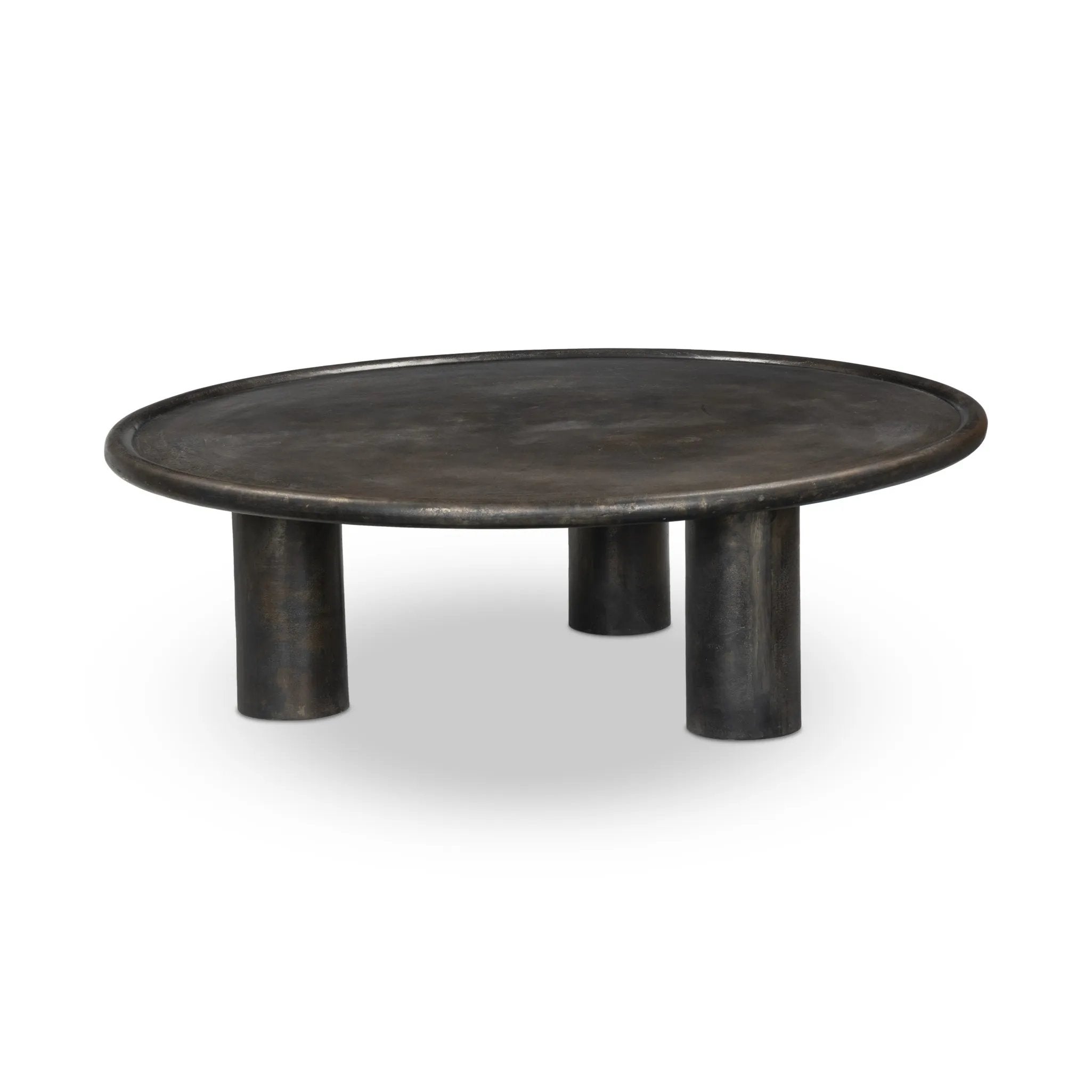 Featuring Cary Distressed Bronze Coffee Table by Four Hands at Amethyst Home. A round, three-legged coffee table of cast aluminum is finished in a beautiful distressed bronze. The result: a luxe take on industrial that moves between spaces and styles with ease.Overall Dimensions: 50.00"w x 50.00"d x 15.75"hWeight : 132.54 lbsMaterials: Aluminum. Amethyst Home provides interior design, new home construction design consulting, vintage area rugs, and lighting in the Des Moines metro area.