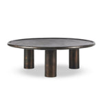 Featuring Cary Distressed Bronze Coffee Table by Four Hands at Amethyst Home. A round, three-legged coffee table of cast aluminum is finished in a beautiful distressed bronze. The result: a luxe take on industrial that moves between spaces and styles with ease.Overall Dimensions: 50.00"w x 50.00"d x 15.75"hWeight : 132.54 lbsMaterials: Aluminum. Amethyst Home provides interior design, new home construction design consulting, vintage area rugs, and lighting in the Park City metro area.