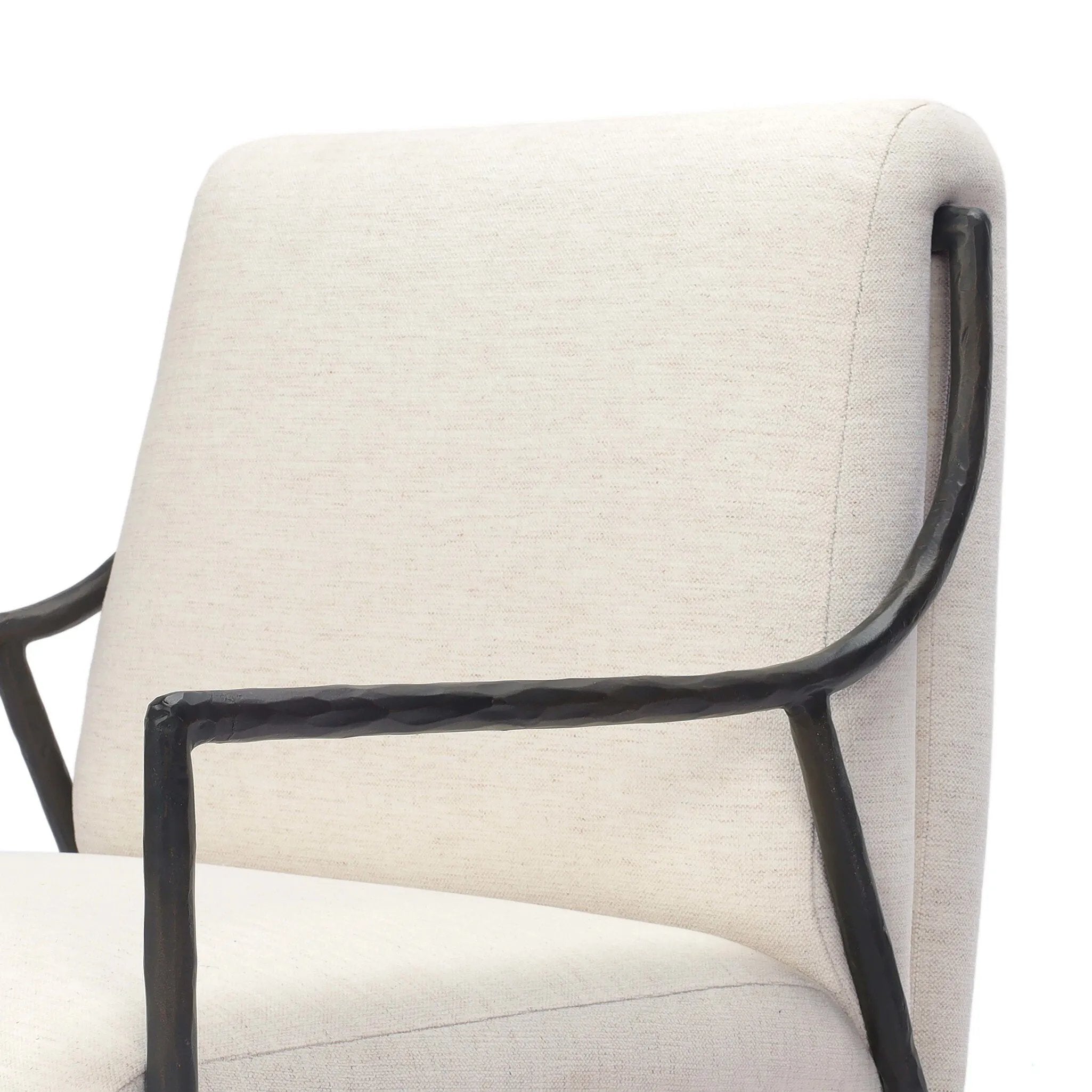 Sink-in comfort, modern appeal and no fuss. This Deco-inspired desk chair's sloped hammered iron arms and ebony metal swivel base stand out against snow white upholstery. Crypton® performance fabric is specially engineered for protection against stains, moisture and odor. Amethyst Home provides interior design, new home construction design consulting, vintage area rugs, and lighting in the Monterey metro area.