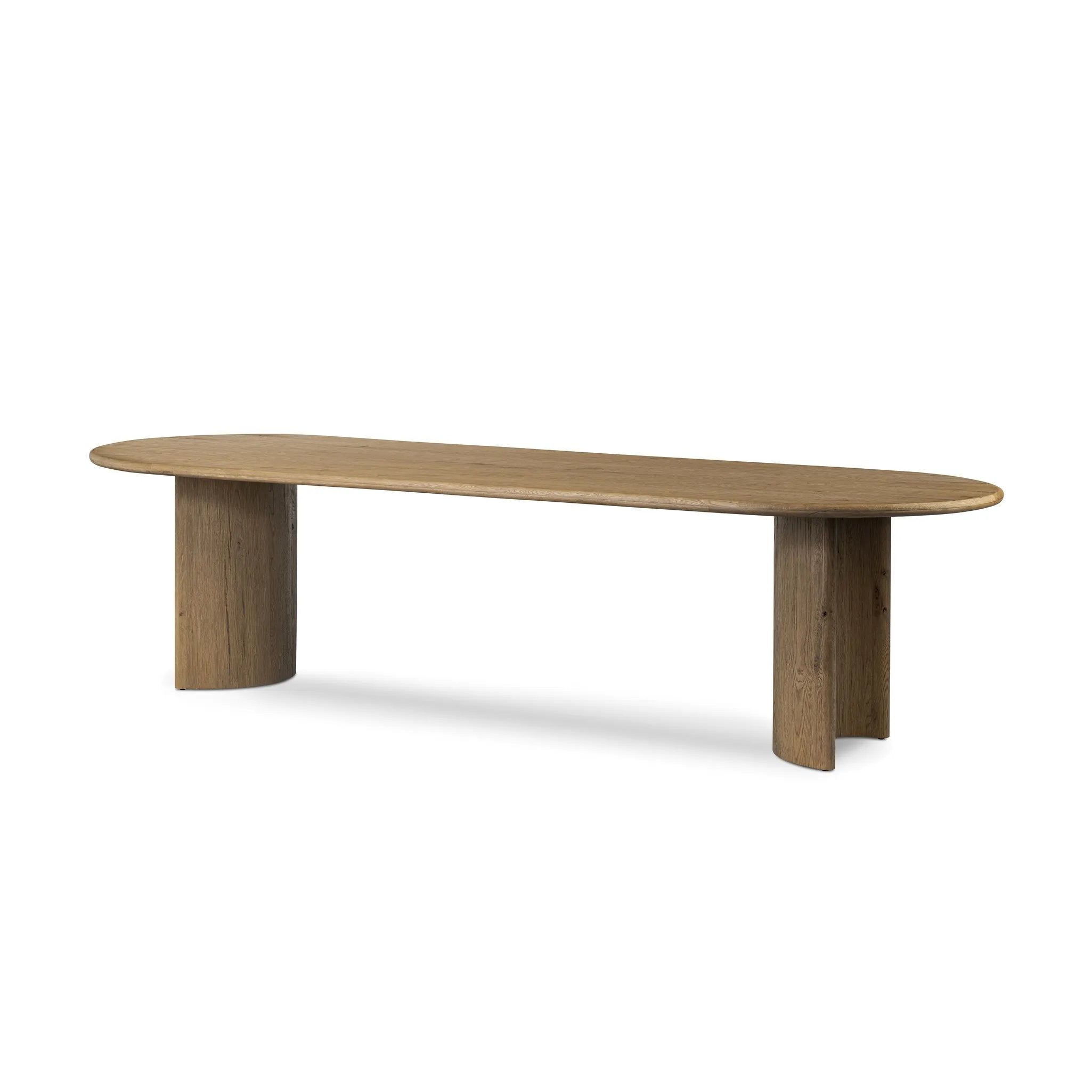 Designed in partnership with longtime Four Hands collaborator Thomas Bina and Brazilian designer Ronald Sasson, a grand-scale dining table is made from solid reclaimed French oak in a natural finish. Rounded edges add a softer, fluid look Amethyst Home provides interior design, new home construction design consulting, vintage area rugs, and lighting in the Tampa metro area.