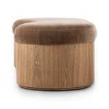 Elevate any room with a curvy statement bench. Made from a kidney-shaped base of toasted ash veneer and a soft, velvety seat Amethyst Home provides interior design, new home construction design consulting, vintage area rugs, and lighting in the Newport Beach metro area.