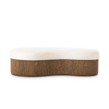 Elevate any room with a curvy statement bench. Made from a kidney-shaped base of toasted ash veneer and a soft, durable Crypton seat. Soft, easy to clean and free of PFAS, Crypton performance fabric is specially engineered for protection against stains, moisture and odor. Amethyst Home provides interior design, new home construction design consulting, vintage area rugs, and lighting in the Alpharetta metro area.
