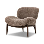 The perfect accent chair, designed for unwinding. Upholstered in a velvety olive chenille made from recycled materials, with wide proportions and cozy curves and cushioning. Slim, tapered wooden legs balance the look Amethyst Home provides interior design, new home construction design consulting, vintage area rugs, and lighting in the Laguna Beach metro area.