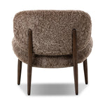 The perfect accent chair, designed for unwinding. Upholstered in a velvety olive chenille made from recycled materials, with wide proportions and cozy curves and cushioning. Slim, tapered wooden legs balance the look Amethyst Home provides interior design, new home construction design consulting, vintage area rugs, and lighting in the Los Angeles metro area.