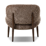 The perfect accent chair, designed for unwinding. Upholstered in a velvety olive chenille made from recycled materials, with wide proportions and cozy curves and cushioning. Slim, tapered wooden legs balance the look Amethyst Home provides interior design, new home construction design consulting, vintage area rugs, and lighting in the Los Angeles metro area.