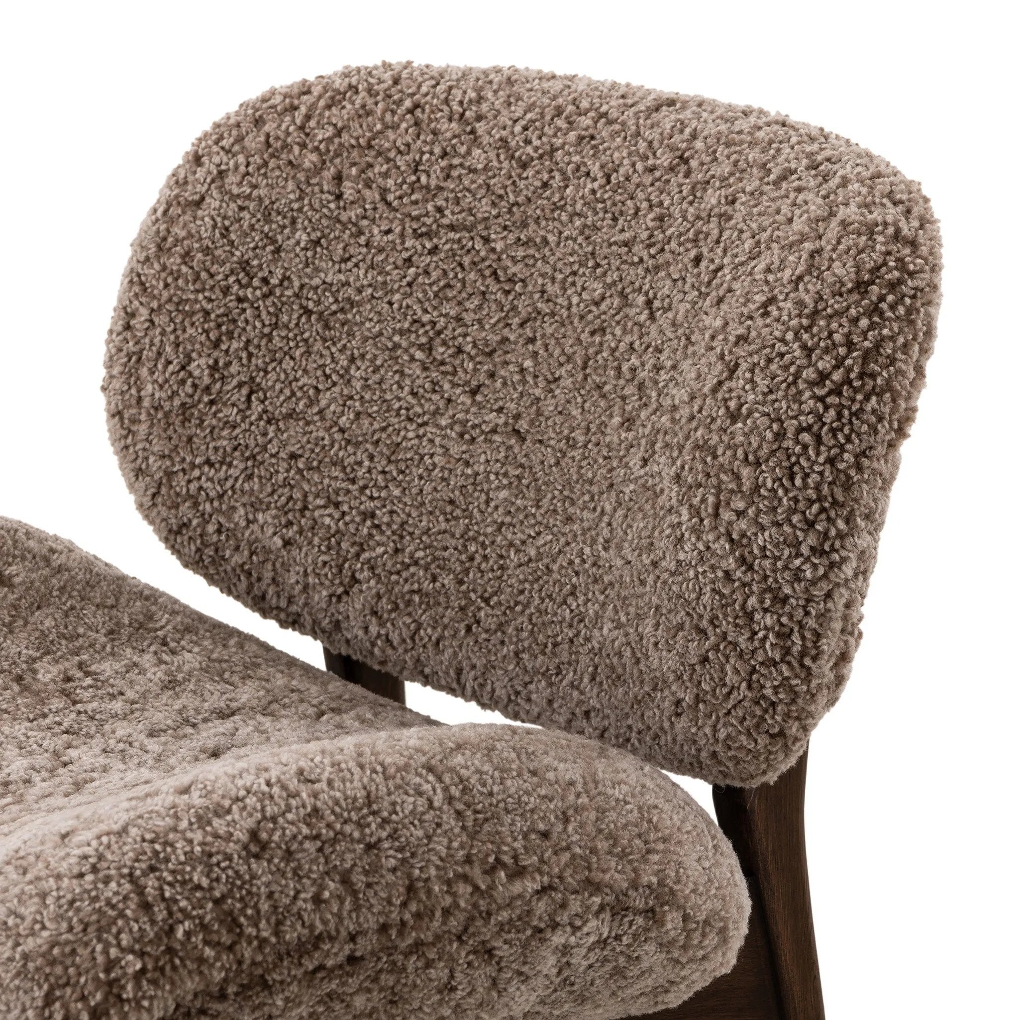 The perfect accent chair, designed for unwinding. Upholstered in a velvety olive chenille made from recycled materials, with wide proportions and cozy curves and cushioning. Slim, tapered wooden legs balance the look Amethyst Home provides interior design, new home construction design consulting, vintage area rugs, and lighting in the Omaha metro area.